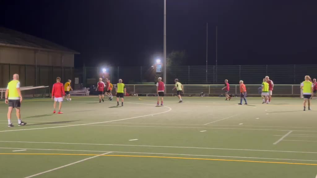 Over 50s football match action in Brackley